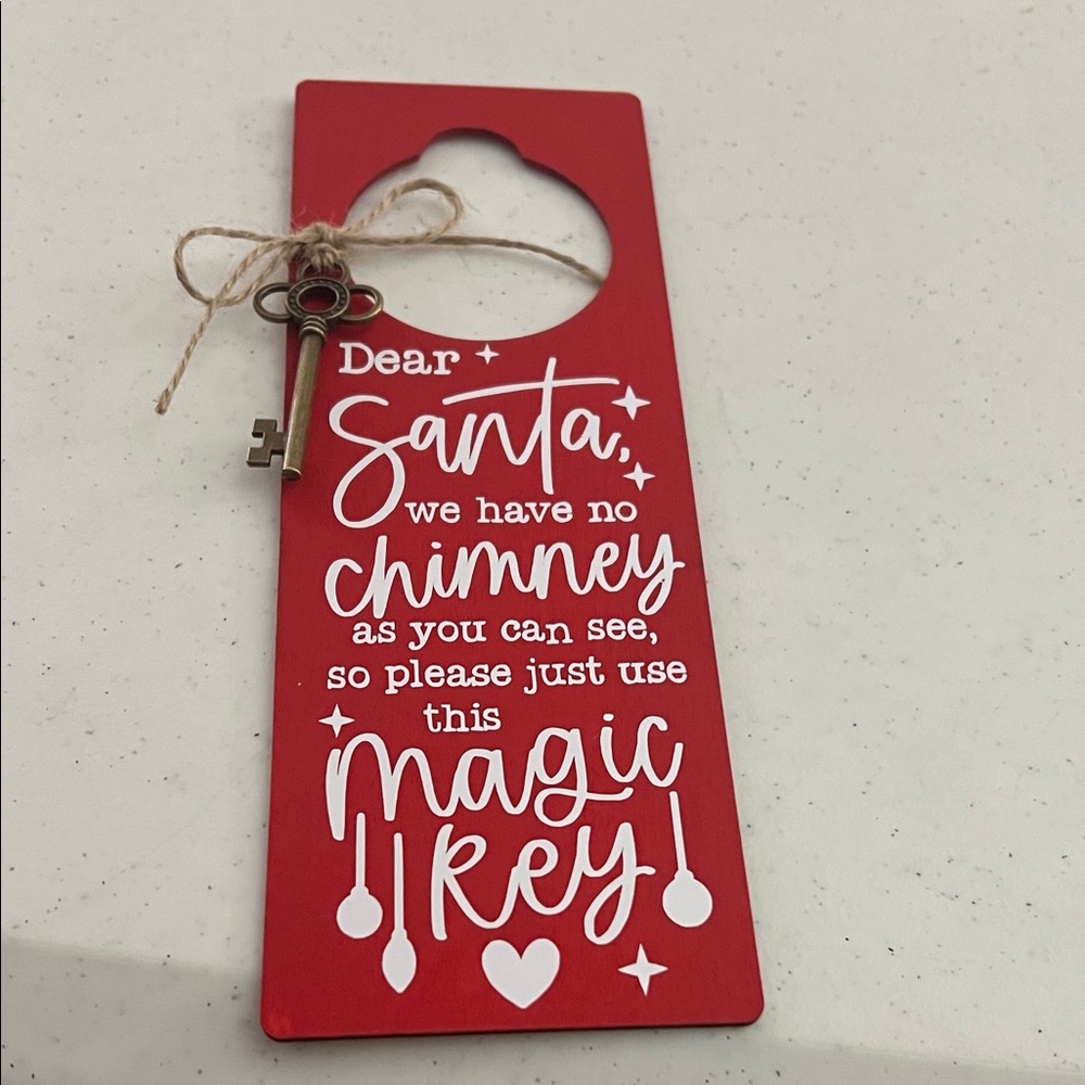 Festive Red Santa Magic Key Door Hanger